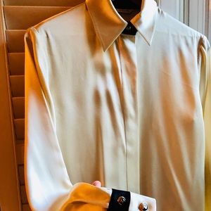 Very lightly used St. John silk blouse.